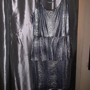 Silver open back peplum mini